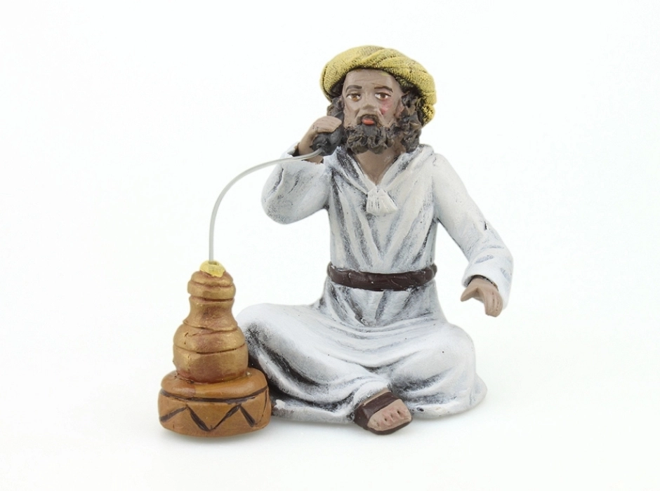 Beduino fumando en pipa 12 cm. Beduino fumando en pipa 12 cm.
