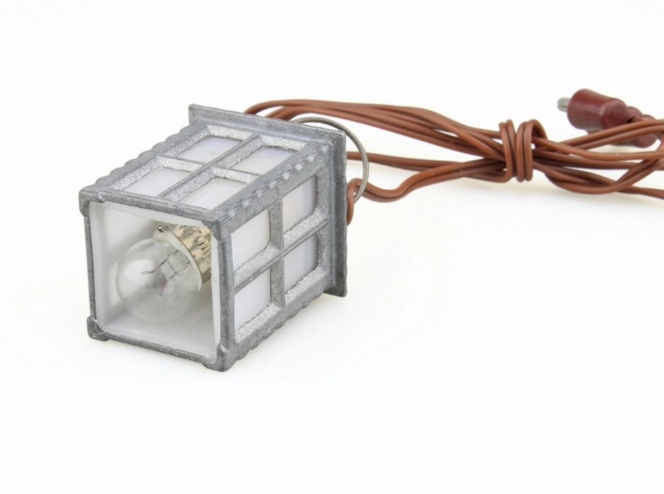 Farol mediano de metal luz blanca 3,5V.