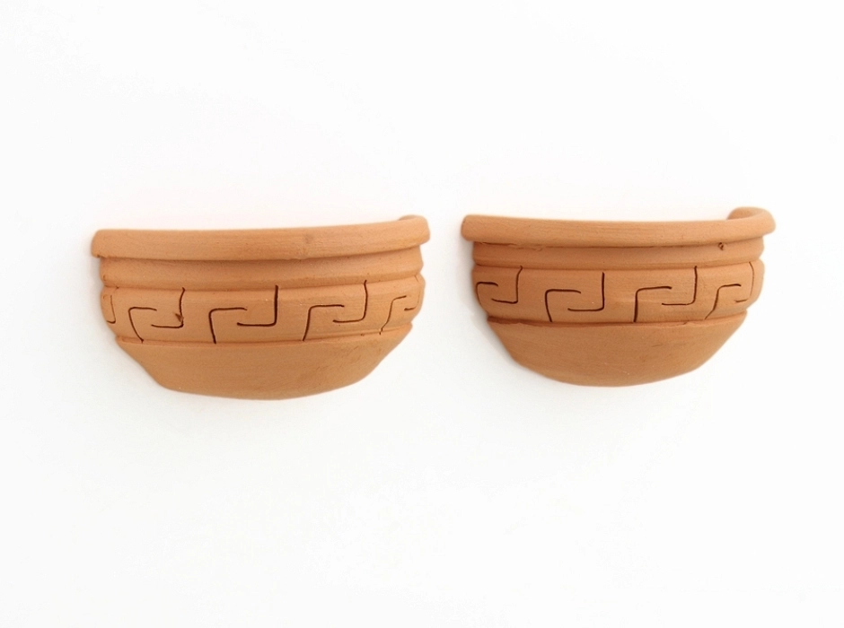 Juego 2 pebeteros de pared greco romanos