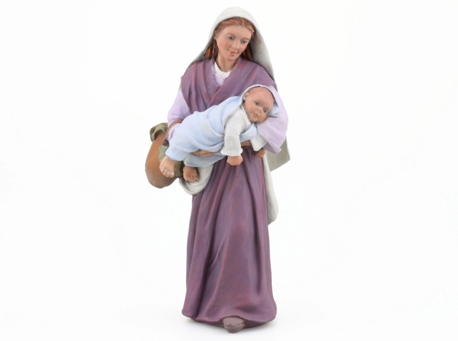 Madre con su niño en brazos 17 cm. Madre con su niño en brazos 17 cm.