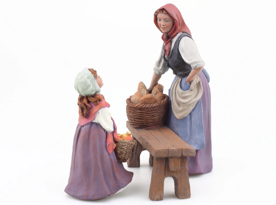 Mujer con cesta de pan en el banco 15 cm.