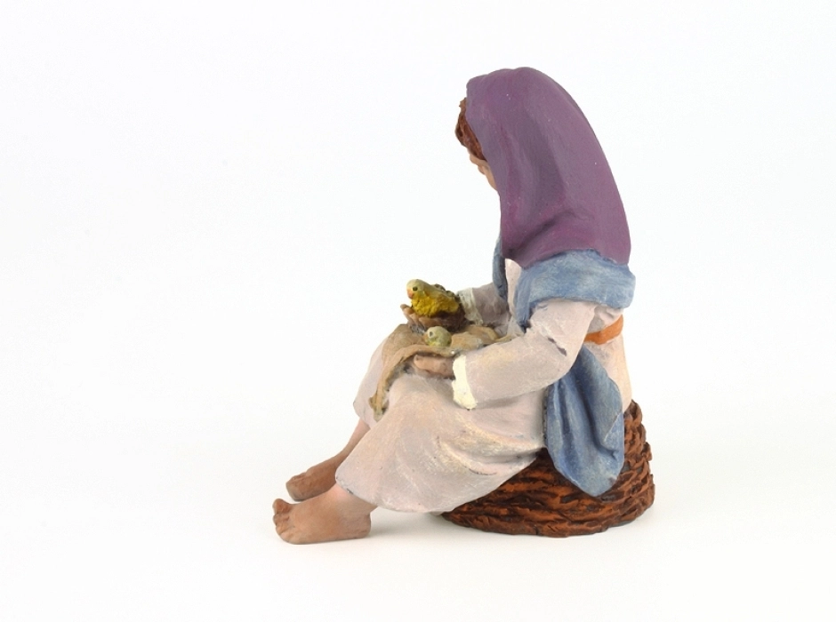 Niña con pollitos 15-17 cm.