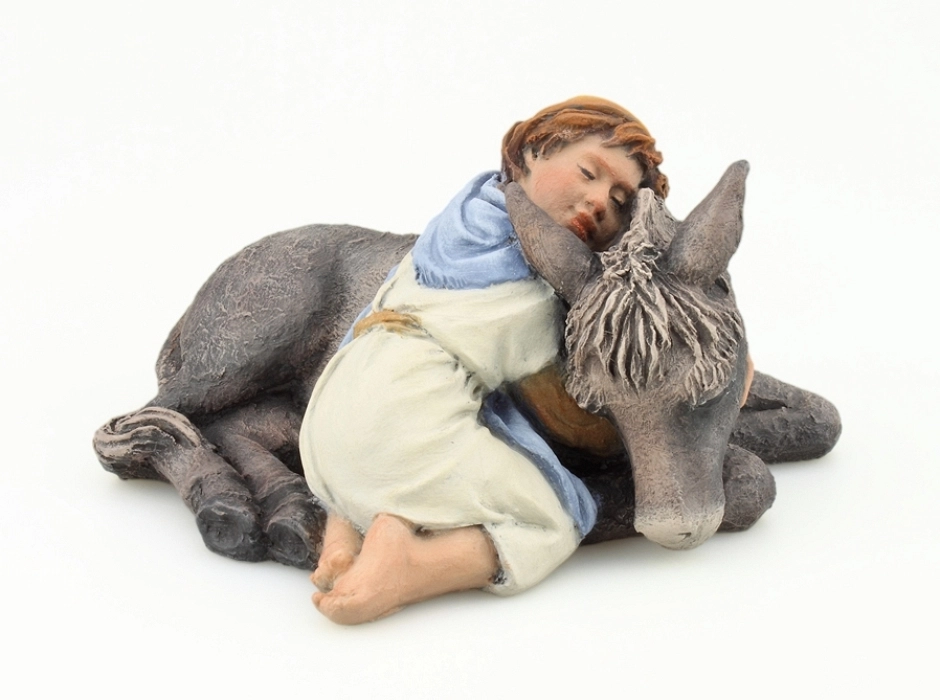 Niño abrazado a la burrita 17 cm. Niño abrazado a la burrita 17 cm.