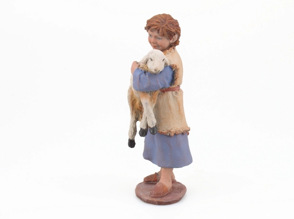 Niño con cordero 17 cm.