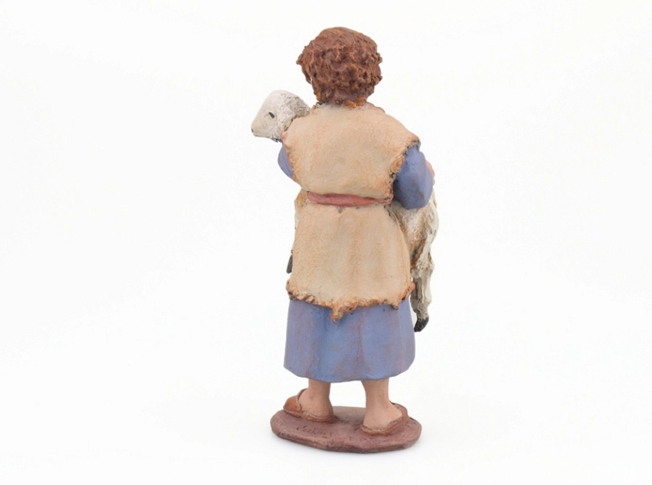 Niño con cordero 17 cm.