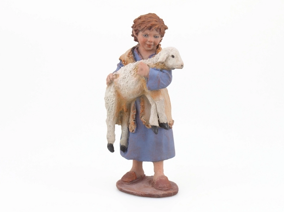 Niño con cordero 17 cm.