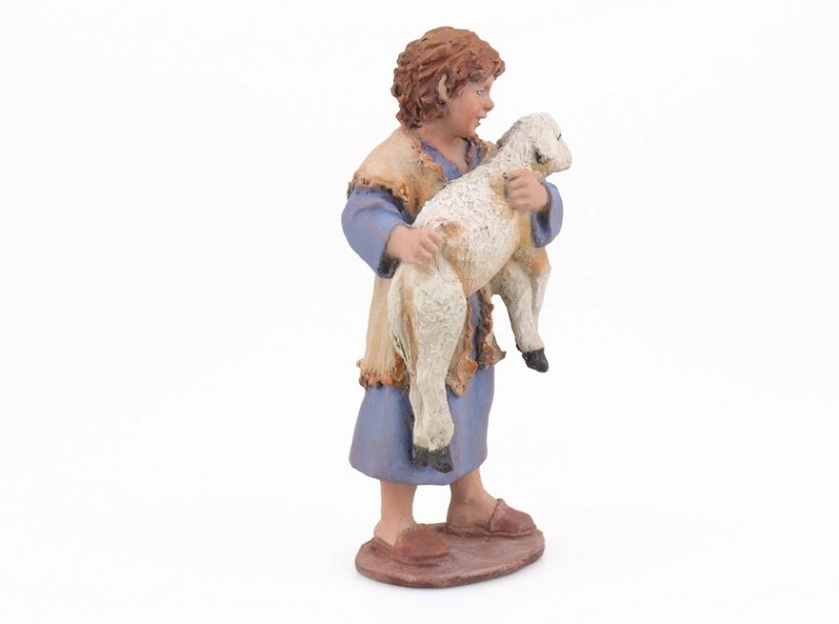 Niño con cordero 17 cm.
