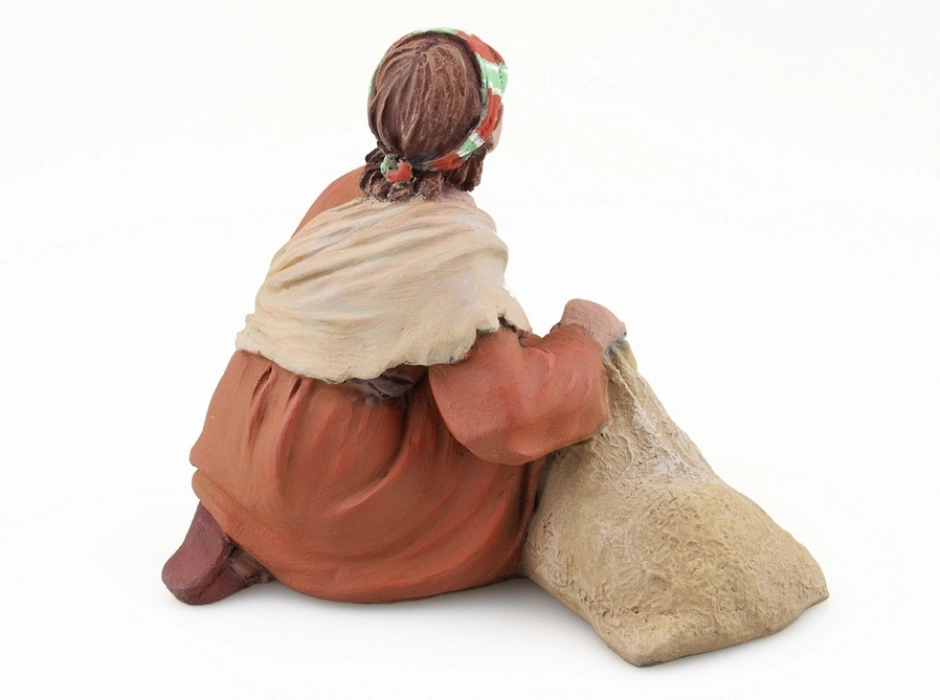 Niño con saco de manzanas 17 cm.