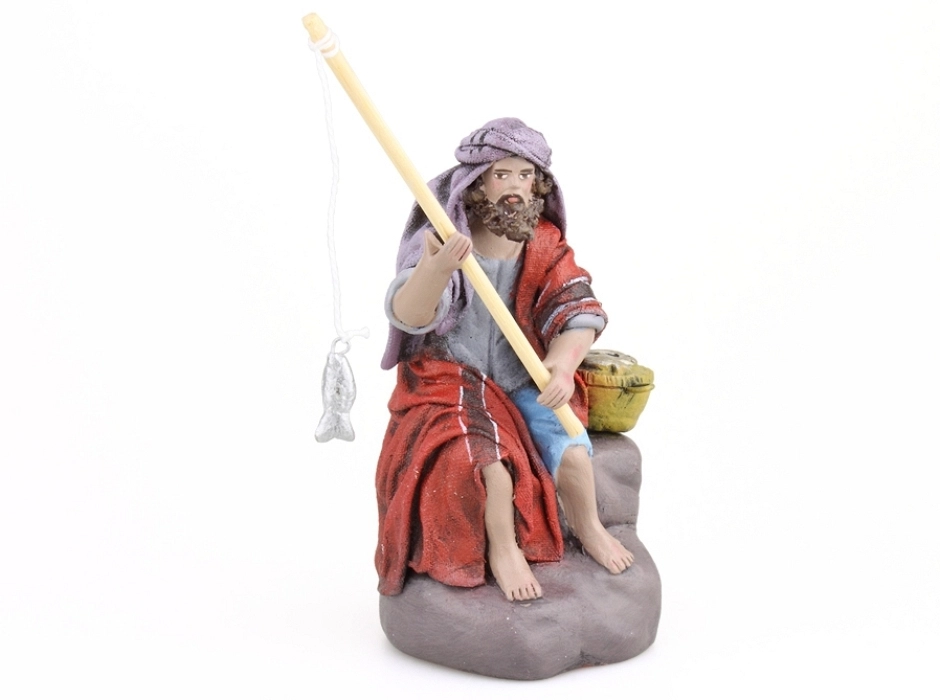 Pescador sobre rocas 12 cm.