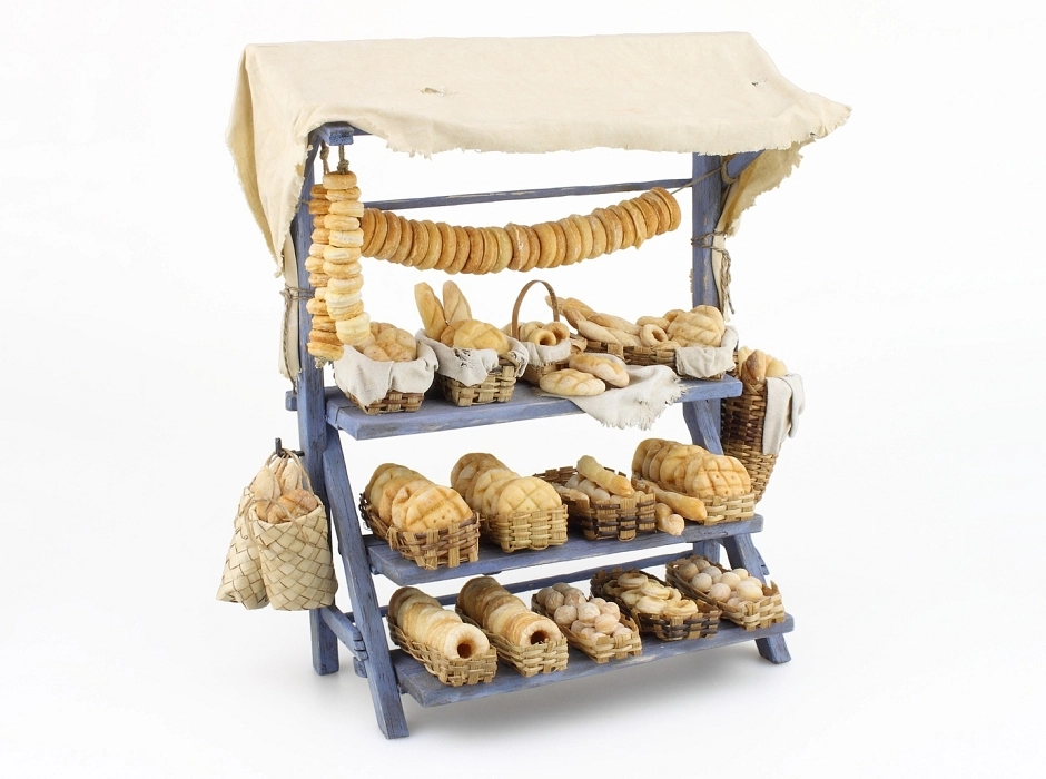 Puesto de mercado con panes horneados 24 cm.