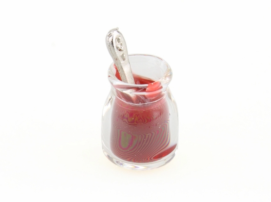Tarro de mermelada con cuchara